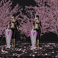 Two Female Figures With Purple V Stands Among Pink Cherry Blossom Trees And Scattered Petals