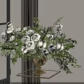 Golden Vase With White Roses And Green Leaves Floral Arrangement On Table