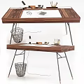 Modern Wooden Office Desk With Metal Frame Featuring Top Glasses Notebook And Wire Baskets