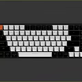 Mechanical Keyboard With Black White Design And Orange Accent Key For Office And Gaming Use