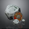 Decorative Grey Stone Object With Round Shield Featuring Red And Yellow Pattern And Small Stones