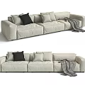 Modern Light Beige Three-Seater Sofa With Decorative Pillows Black Pillow And Plaid Blanket