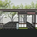 Modern Entrance Gate With Metal Railings Glass Panels And Landscaped Greenery Around