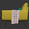 Modern Yellow Double Sofa With Green Cushions And Patterned Blanket On Armrest