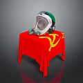 White and Green Helmet with Transparent Visor on Red Tablecloth with Yellow Hammer Sickle Symbol