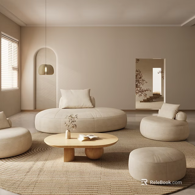 Modern Neutral Living Room Interior With Circular Sofa Round Coffee Table Pendant Light And Ottoman 3d model 