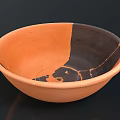 Hand Carved Ceramic Bowl With Orange And Black Cracked Sculptural Design