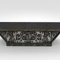 Vintage Design Table Featuring Dark Top And Intricate Carved Base Details