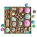 Delicious Colorful Assorted Chocolates With Various Decorations Arranged In Green Box