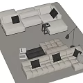 Beige Sectional Sofa With Black Cushions Side Table And Floor Lamp On Rug