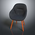 Modern Black Leather Chair with Orange Wooden Legs and Curved Stylish Design