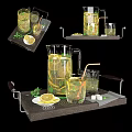Refreshing Citrus Lemon Mint Drink in Glass Pitcher with Glasses and Sugar Cubes on Tray