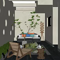 Courtyard Garden Interior Design With White Walls Circular Cutouts Skylight Sofa And Green Plants
