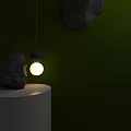 Decorative Hanging Light With Two Spherical Design White Cylindrical Base Black Stone And Dark Wall