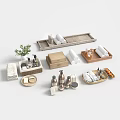 Bathroom Decorative Accessory Set With Rolled Towels Trays Bottles Wooden Boxes And Green Plant