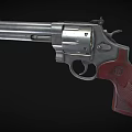 Classic Revolver With Silver Metal Cylinder And Red Grip Design Features