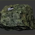 Natural Green And Black Raw Stone With Rough Surface And Mineral Texture