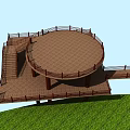 Wooden Bridge Connecting Black Road And Platform Over Green Grass Under Blue Sky