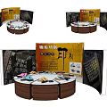 Art Installation With Curved Display Panels And Circular Wooden Table With Colorful Items