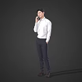 A Man Standing And Talking On Mobile Phone In White Shirt And Dark Pants