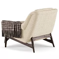 Beige Accent Chair with Plaid Pillow and Fringed Plaid Blanket on Dark Wooden Legs