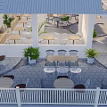 Outdoor Café Patio With White Canopy Pillars Tables Chairs And Green Plants