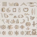 Various Carved Ornaments Including Butterfly Shell Flower And Geometric Patterns For Design Projects