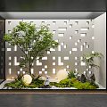 Indoor Landscape Design With Green Trees Grass Stones Round Lights Perforated Wall And Glass Partition
