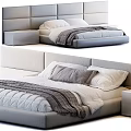 Modern Upholstered Double Bed With Plush Pillows Cozy Blanket And Nightstand