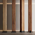 Wooden Columns With Natural Grain And Black Bases In Modern Interior Space