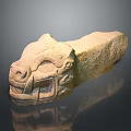 Traditional Stone Beast Head Sculpture With Intricate Carved Details And Texture