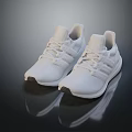 White Sports Sneakers with Knitted Upper White Sole Laces and Reflective Surface on Dark Background