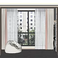 Comfortable Bean Bag Chair in Room Interior With Large Window Light Curtains and Green View