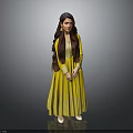 A Woman in Yellow Flowy Dress with Long Hair and Earrings Standing Against Gray Background