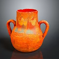 Orange Clay Vase Sculpture With Two Handles And Textured Surface Design