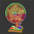 Portable Electric Fan With Red Frame Yellow Blades And Orange Base For Home Use