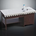Wooden Table With White Scalloped Edge Tablecloth Decorative Items And Lower Shelf Cabinet