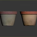 Two Terracotta Garden Decor Pots With Red Wavy Rim Design Details