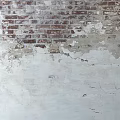 Weathered Brick Wall With Peeling Paint Near Window And Wooden Floor