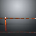 Orange Post Red White Striped Barrier With Gray Background And Floor Reflection