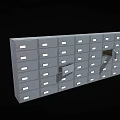Gray Metal File Cabinets With Multiple Drawers Some Partially Open And Label Slots
