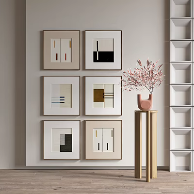 Modern Interior With Framed Artworks In Neutral Tones Pink Vase Golden Stand White Shelves 3d model