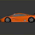 Orange High Performance Race Car With Sleek Design And Rear Spoiler