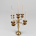 Classical Golden Candelabra With Multiple Arms And White Candles Elegant Decorative Design