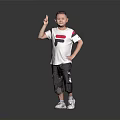 Boy Wearing White T Shirt With Red Black Design Black Shorts Gesturing On Gray Background