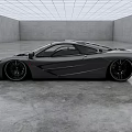 Gray Sports Car With Sleek Design And Black Wheels In Spacious Indoor Concrete Background