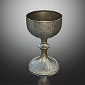 Engraved Metal Goblet With Tall Stem And Decorative Base For Household Use