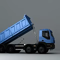 Blue Utility Dump Truck With Tipping Bed For Heavy Duty Construction Use
