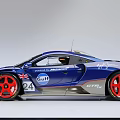 Blue Racing Car With Large Rear Wing Red Wheels Sporty Stripes And Number 220