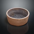 Handcrafted Rustic Clay Pot With Textured Surface And Round Design